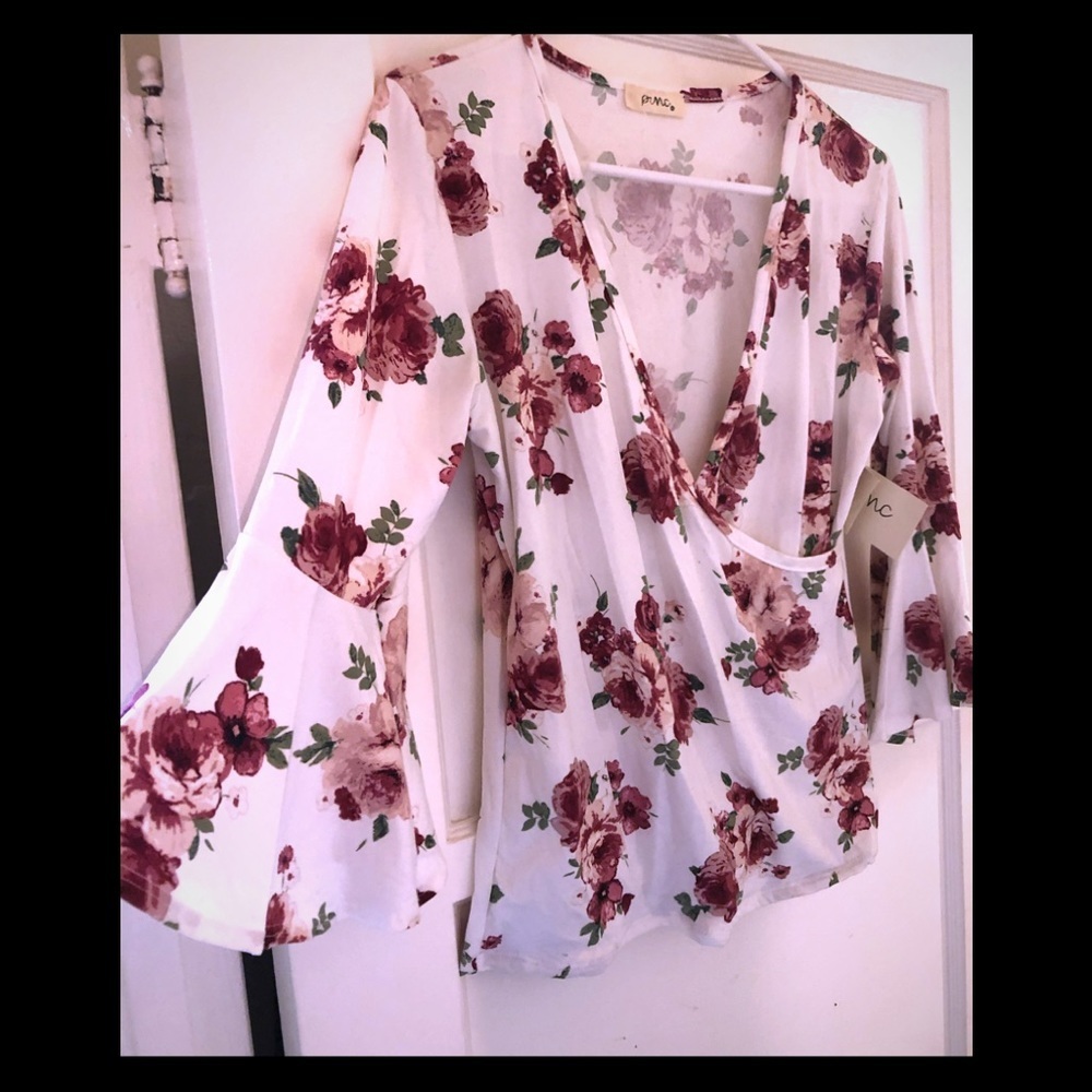 *NWT- Bell sleeve top with wrap around style*